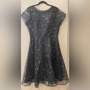 Disney’s Huaunted Mansion dress in large. Sheer black organza with built in slip